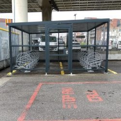 closed mesh or wooden bike shelter